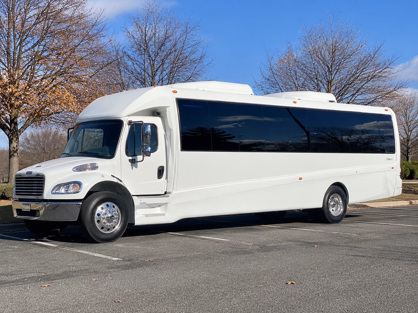 Wedding guests seated inside a party bus serving Glendale